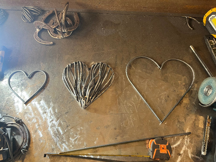 Trio of driftwood hearts