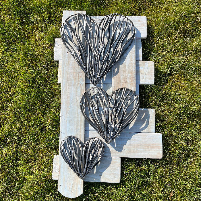 Trio of driftwood hearts