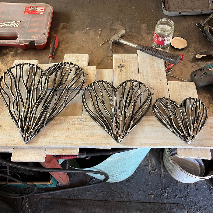 Trio of driftwood hearts