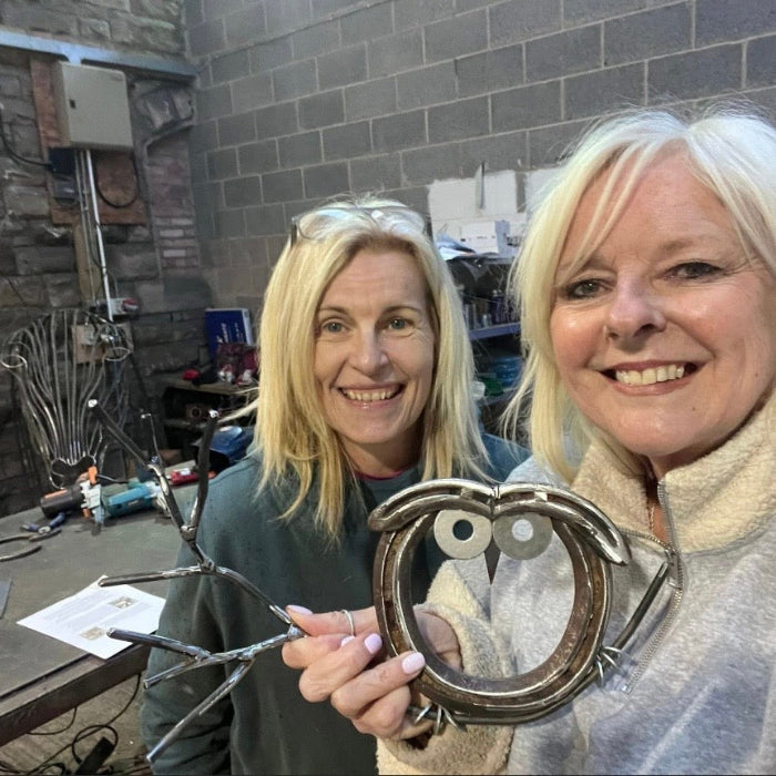 Horseshoe owl on a branch